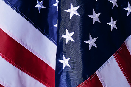 close up shot of the waving flag of the United States of America, a Photo by 1981 Rustic studio kan