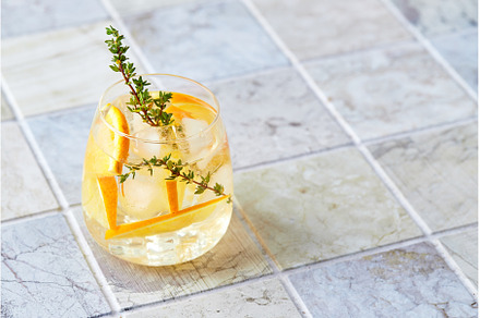 Refreshing cocktail with ice, orange, a Food & Drink Photo by Irina Burakova