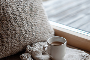 Cozy hygge scene with a cup of, a Food & Drink Photo by MistyDay