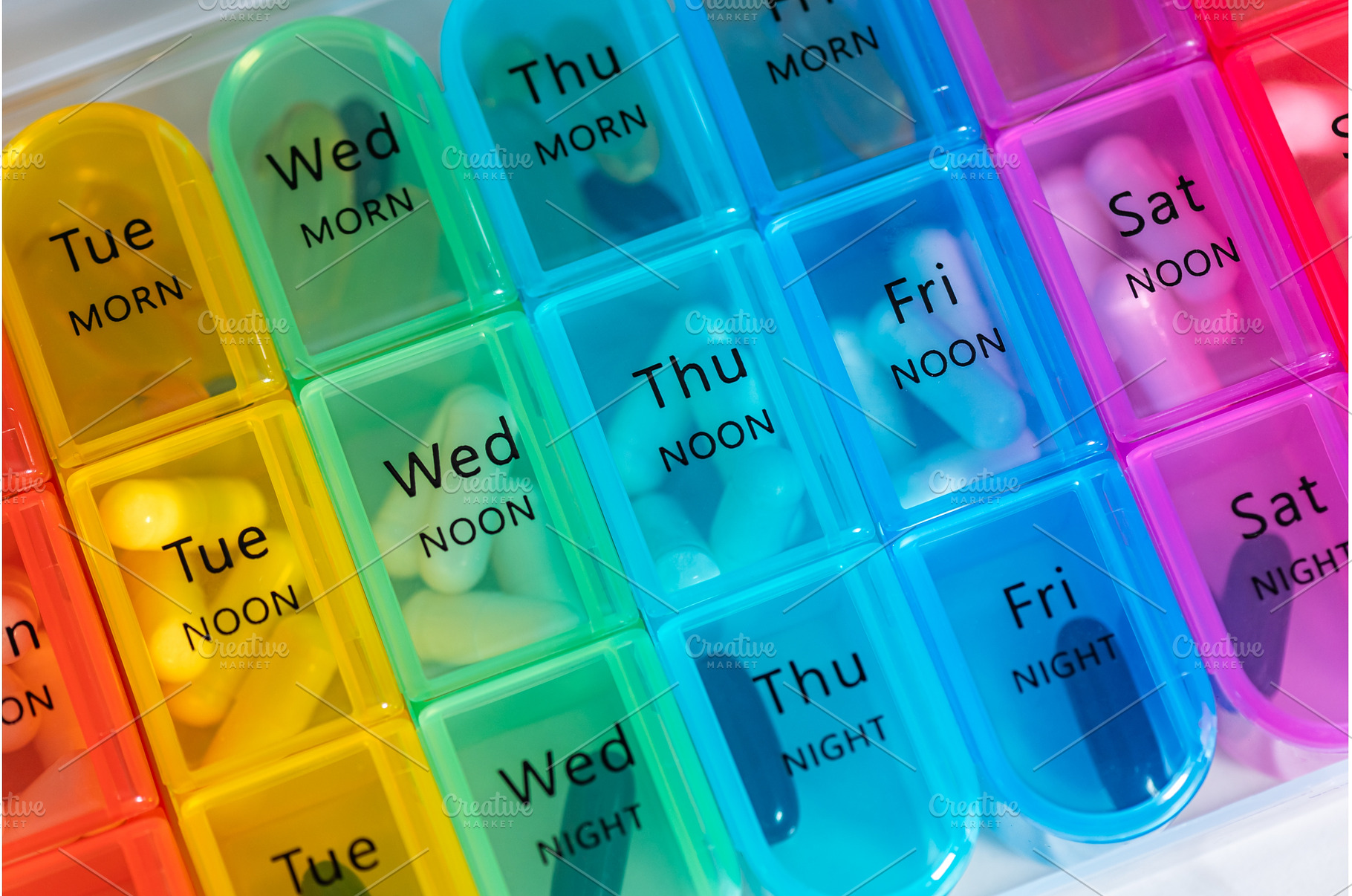 Weekly Pill Box With Vitamins, a Health & Medical Photo by MAnuta