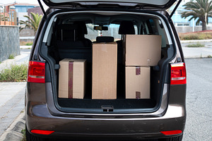 Car trunk packed with moving boxes, a Transportation Photo by etorres69