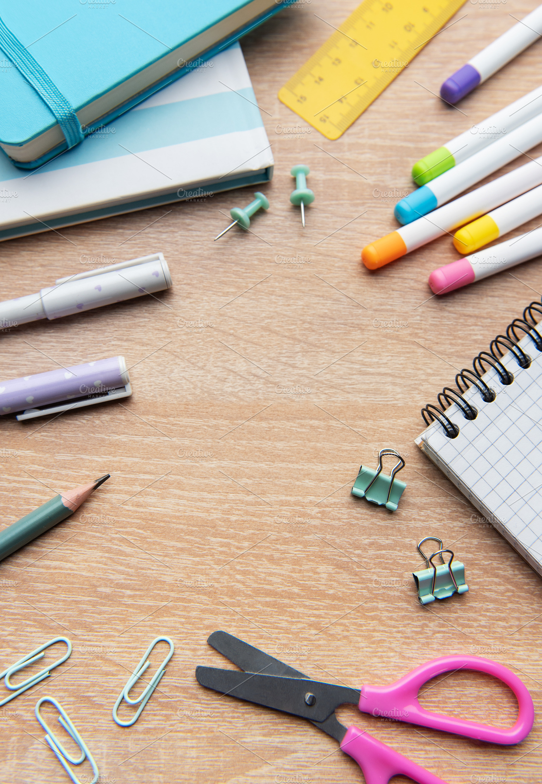 Colorful school and office supplies on wooden desk, a School & Education Photo by Olena Rudo