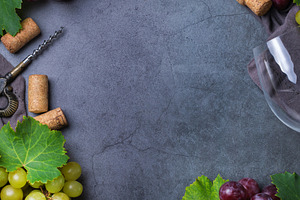 Wine tasting and degustation concept. Grape vine, bottle, glasse
