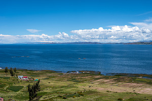 Lush green landscape overlooking Lake Titicaca from Llachon, Per, a Nature Photo by GoodGoods