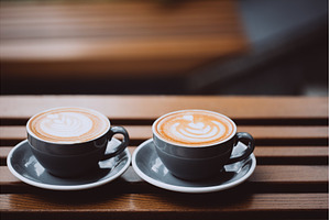 Two cups of cappuccino, a Food & Drink Photo by Anna Efetova