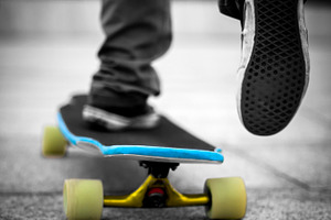 Skateboarder featuring action, adult, and air