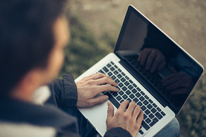 Man working at computer stock photo containing computer and man