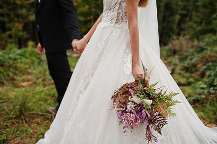 Bride and groom holding beautiful tender wedding bouquet., a Photo by AS photostudio