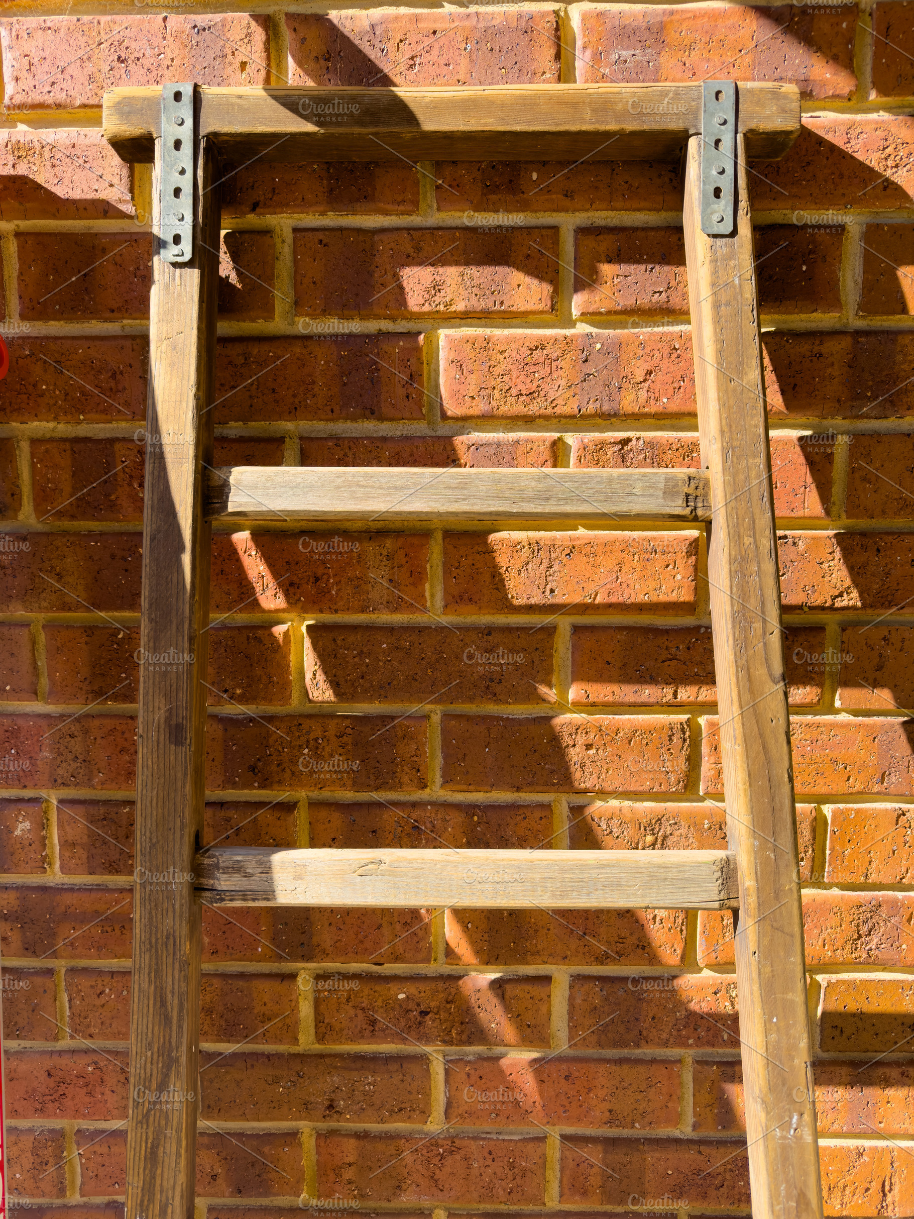 Vintage Wooden Ladder On Bricks, an Abstract Photo by THP Creative