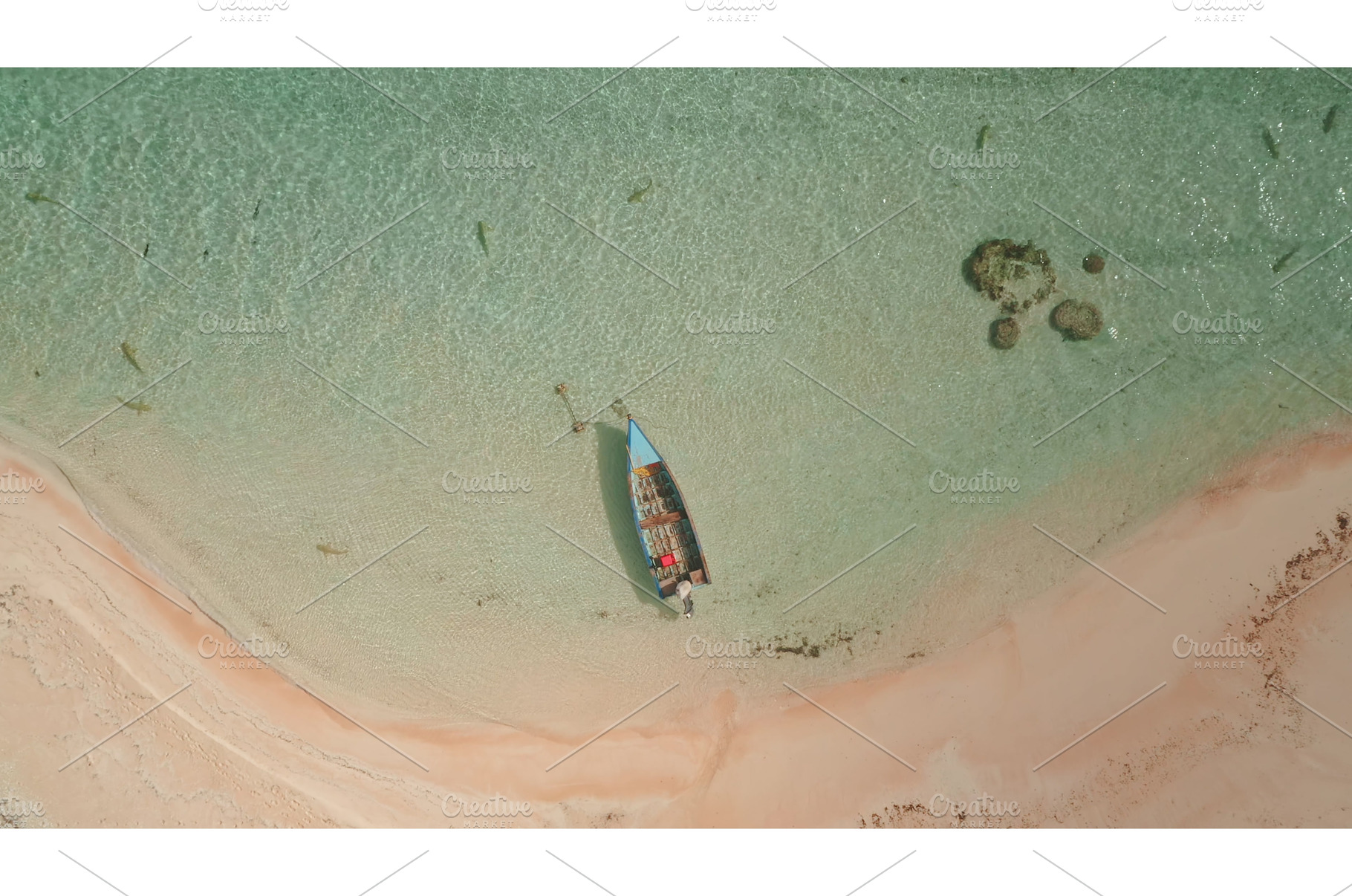 Lonely boat anchored near a pink, a Nature Photo by Goinyk