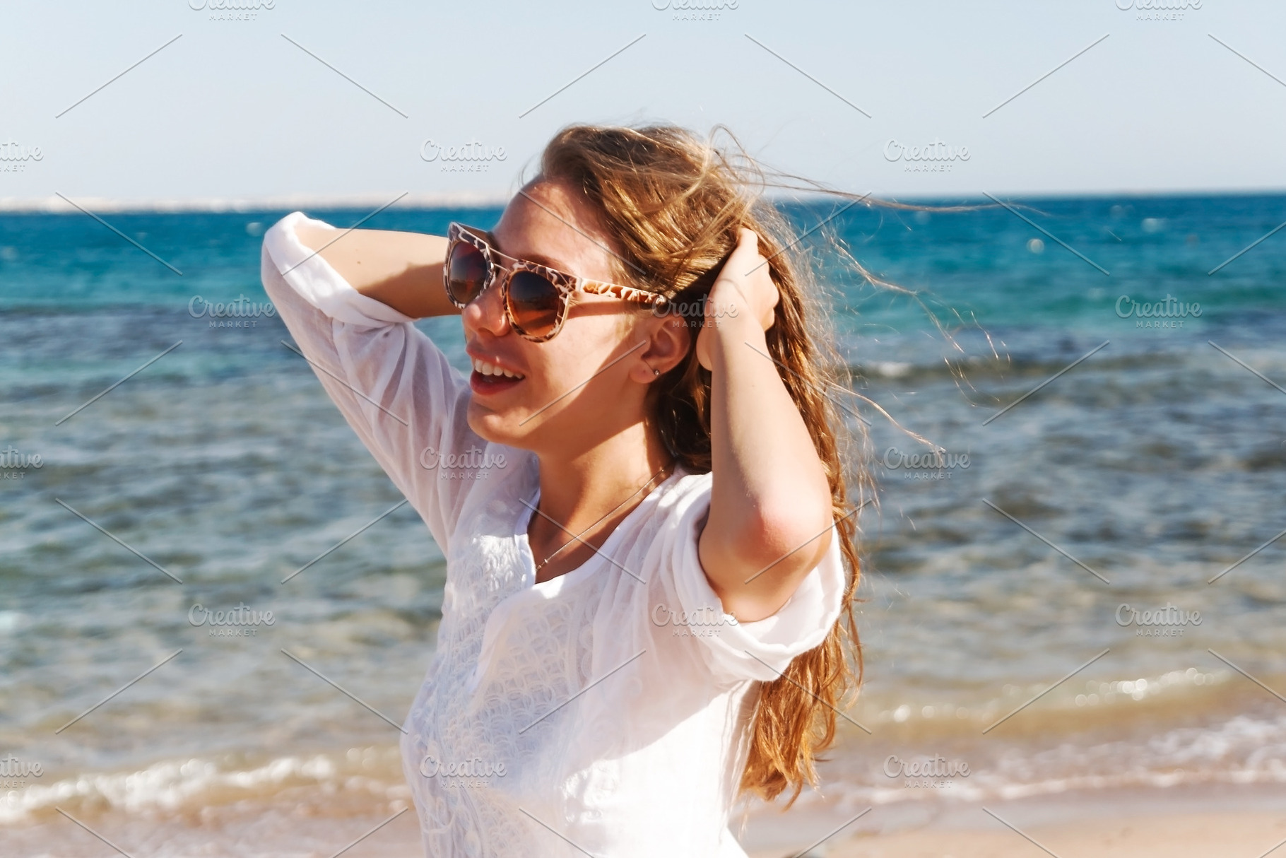 close-up portrait of a beautiful young brunette girl with long h, a Person Photo by TanaCh