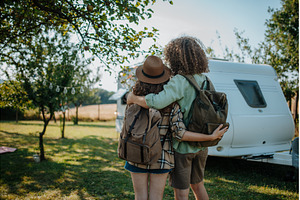 Rear view of couple looking at, a Person Photo by HalfPoint