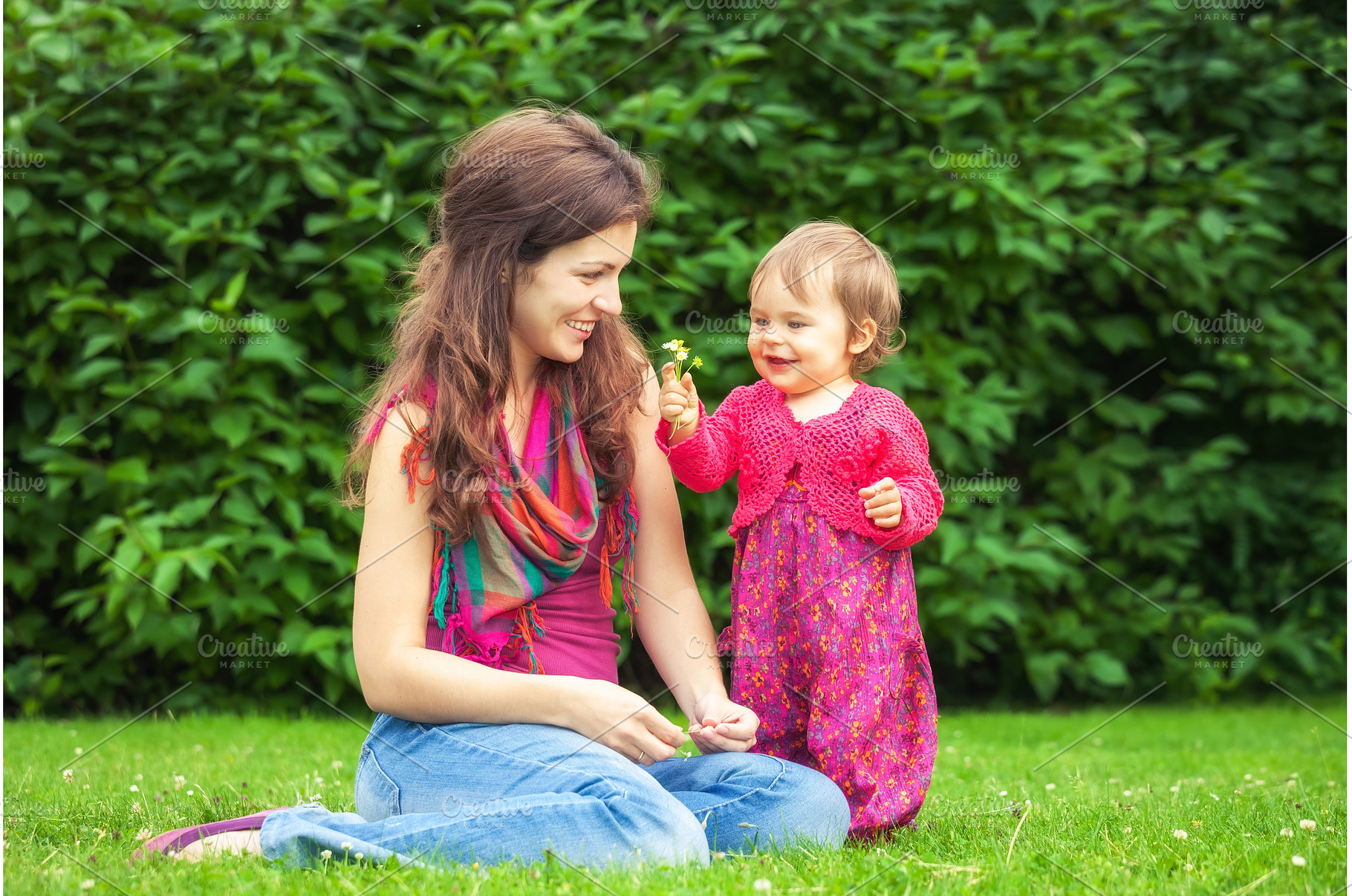 Mother with baby in the park, a Person Photo by sborisov