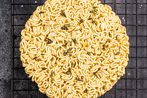 Raw instant ramen noodles, perfectly twisted and ready to be boi, a Food & Drink Photo by composter-box@mail.ru
