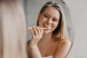 Oral hygiene, healthy teeth and care. Young woman brushing teeth with toothbrus, a Photo by Prostock-Studio (Thumbnail 3 of 3)