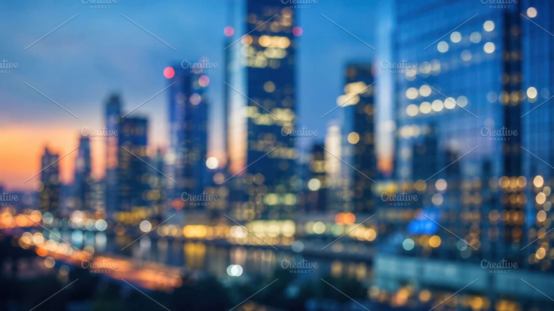 City skyline at dusk with lights, a Photo by Beautiful things