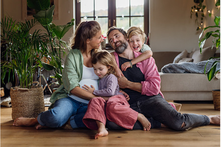 Portrait of young family at home, a Person Photo by HalfPoint