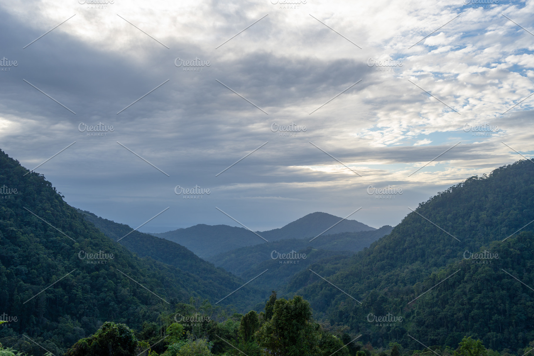 Mountain landscape near Tentena in Sulawesi, Indonesia under clo, a Nature Photo by GoodGoods