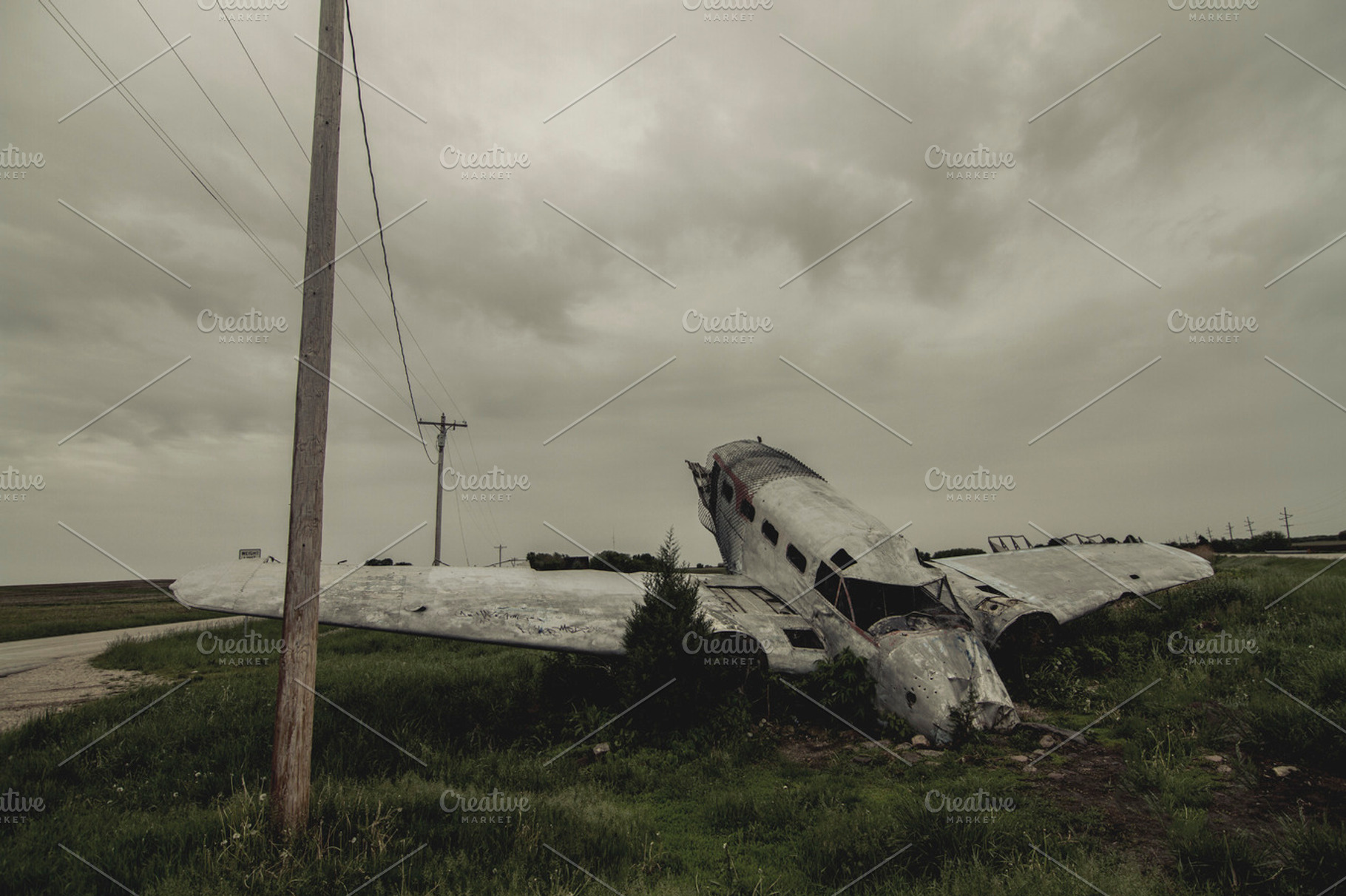 Airplane crash featuring airplane, abandoned, and field