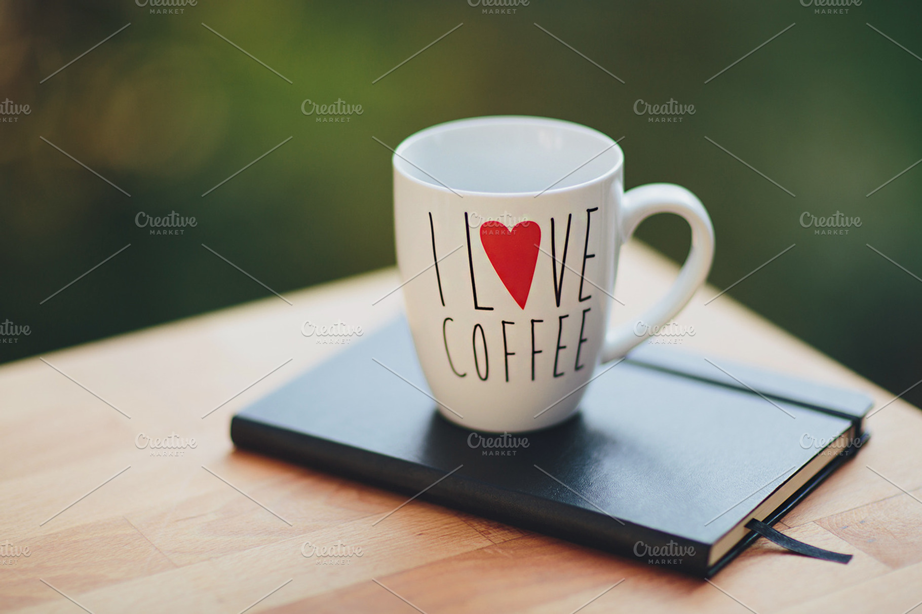 Moleskine & I love coffee cup, a Photo by M. Klasan
