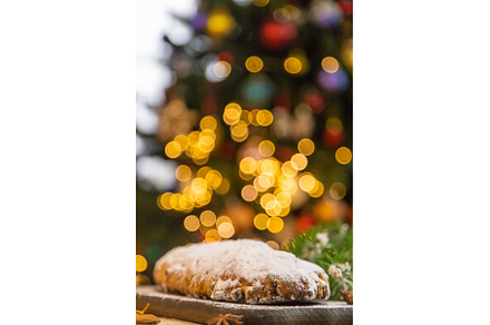 Stollen Christmas cake on the table, a Holiday Photo by yanadjana