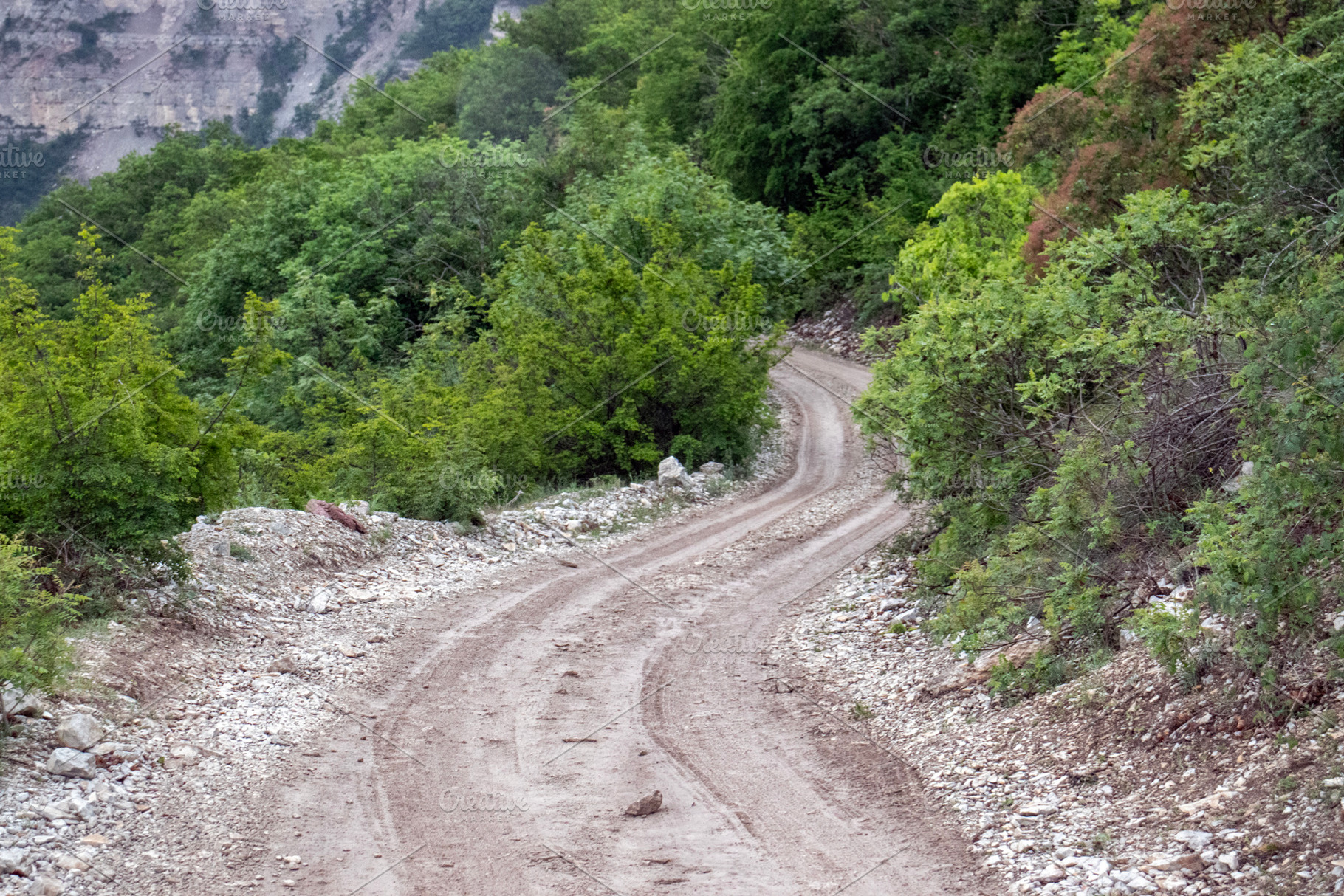 Turn in the road in the mountains., a Photo by Schreibikus