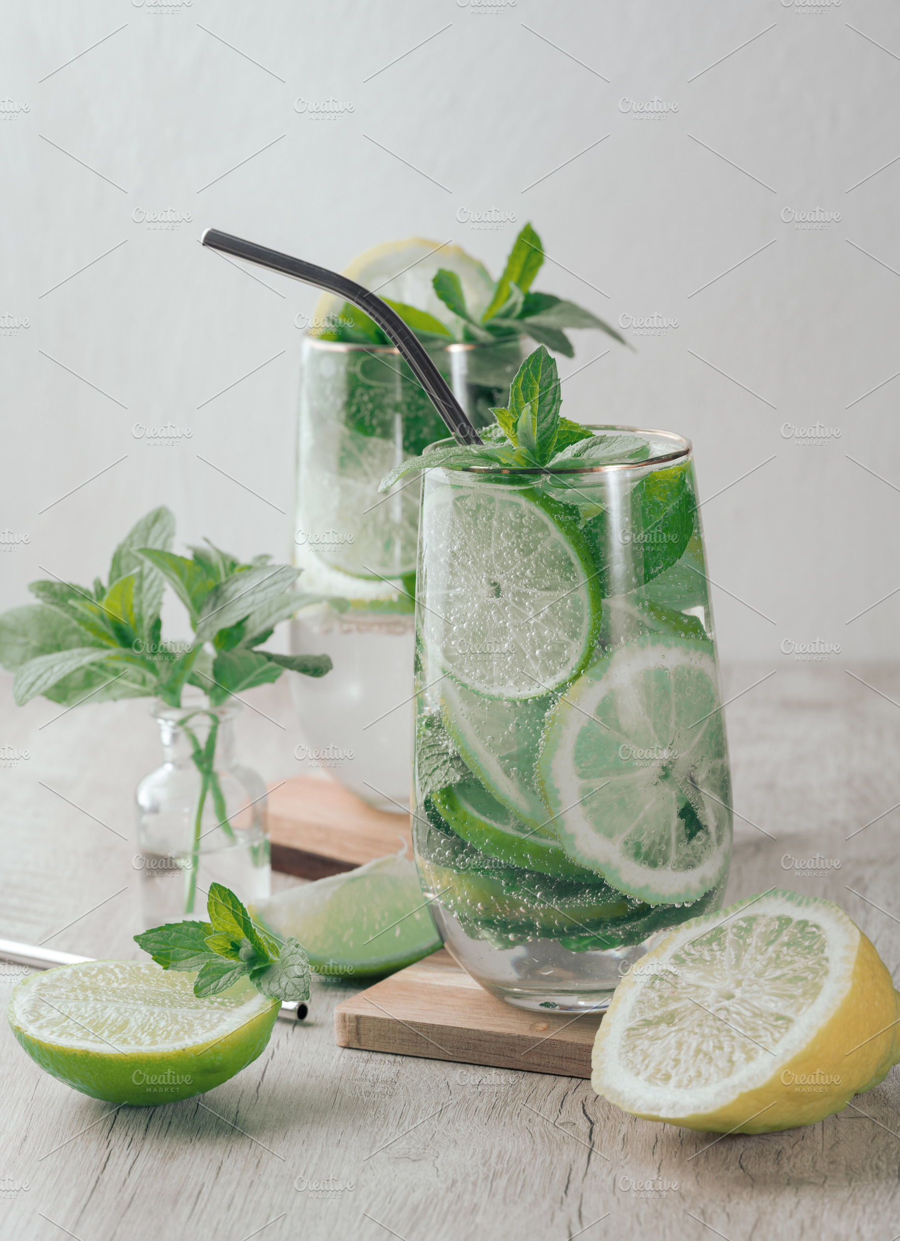 Summer drink with lime and mint. Cold drink, non-alcoholic mojit, a Food & Drink Photo by ndanko
