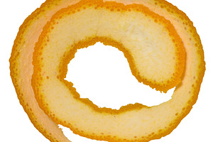 Twisted strip of orange peel on isolated background, top view, a Food & Drink Photo by ndanko