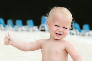 Baby on a beach, a Photo by saiko3p