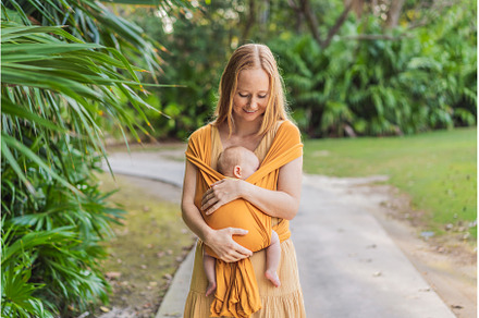 Mother holding her little baby in a