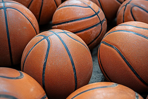Basketballs arranged in a sports facility for practice and train, a Photo by AlyaAnd