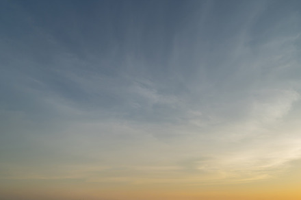 Sunset sky. Abstract nature background. Dramatic blue with orang, a Background Photo by Tampatra