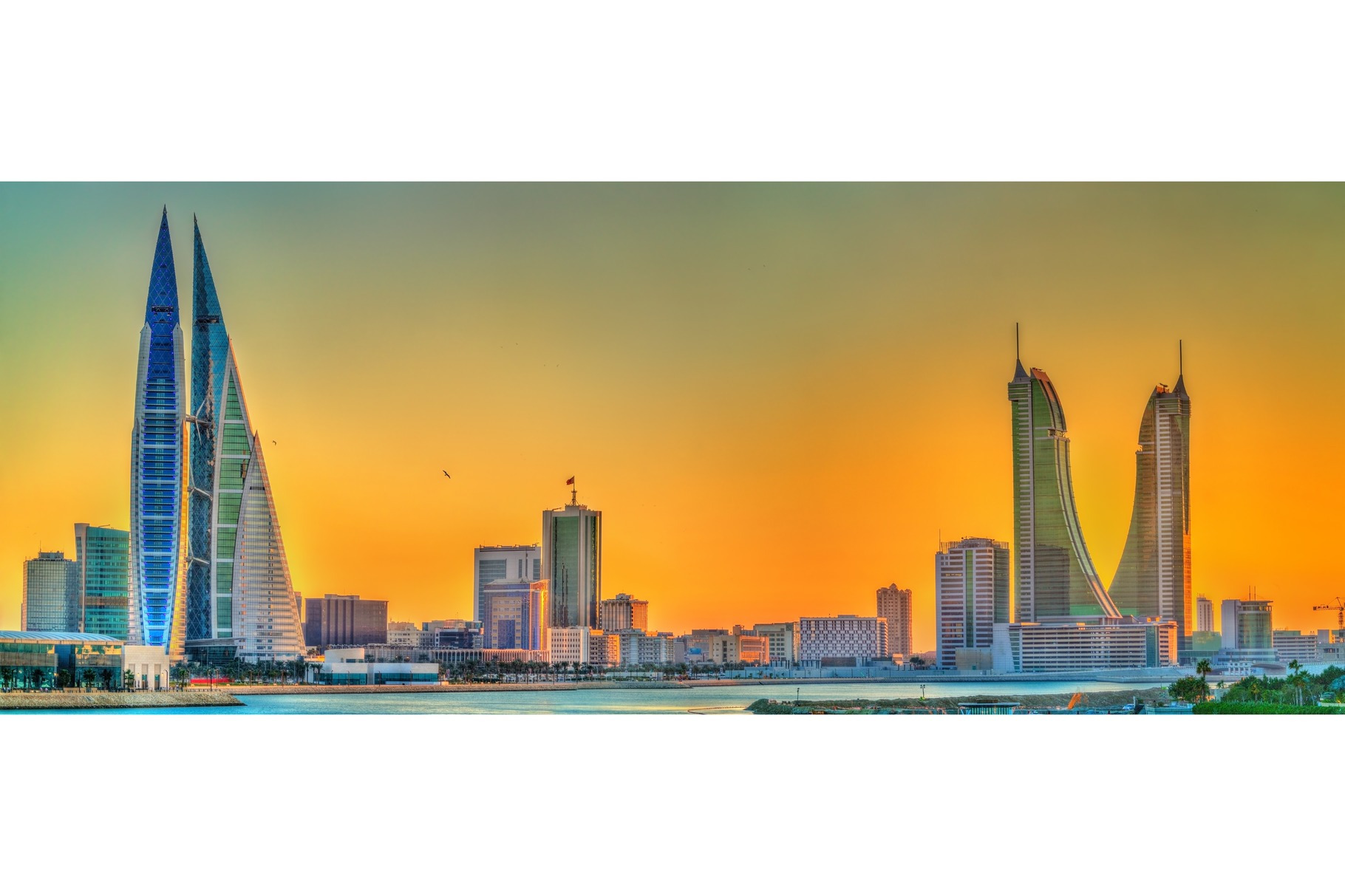 Skyline of manama at sunset the kingdom of bahrain featuring ...