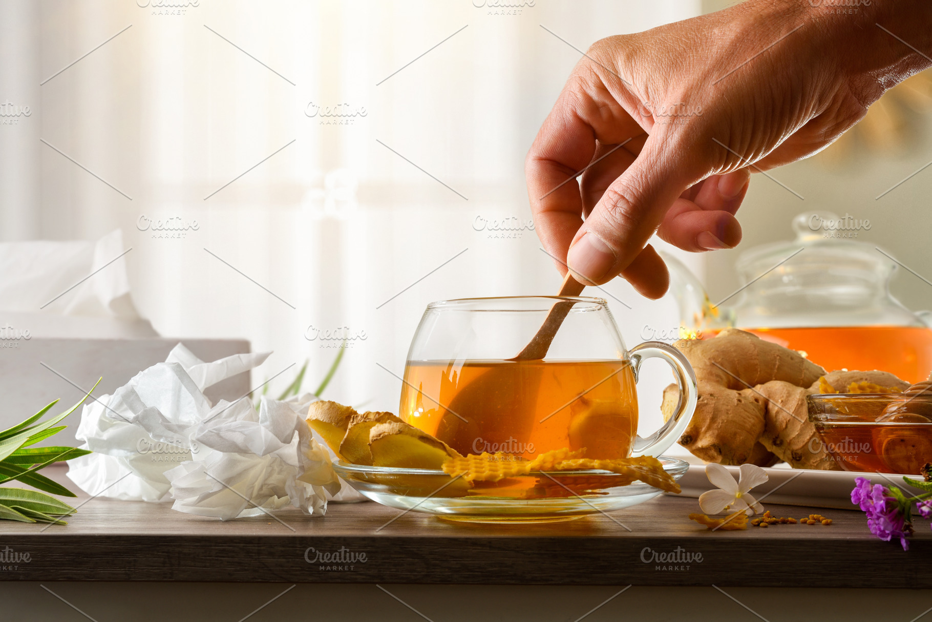 Preparing a ginger and honey infusion to combat cold symptoms, a Food & Drink Photo by Davizro's Market