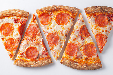 pepperoni pizza slices on white back, a Food & Drink Photo by Budarinphoto