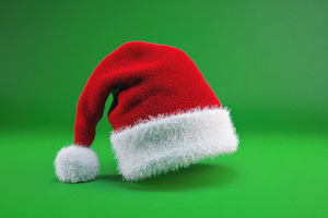 Bright red Santas hat icon appears a, a Photo by Iftikhar Alam