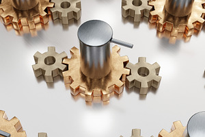 Metal gears and pistons arranged on reflective industrial surface, an Industrial Photo by RF Images