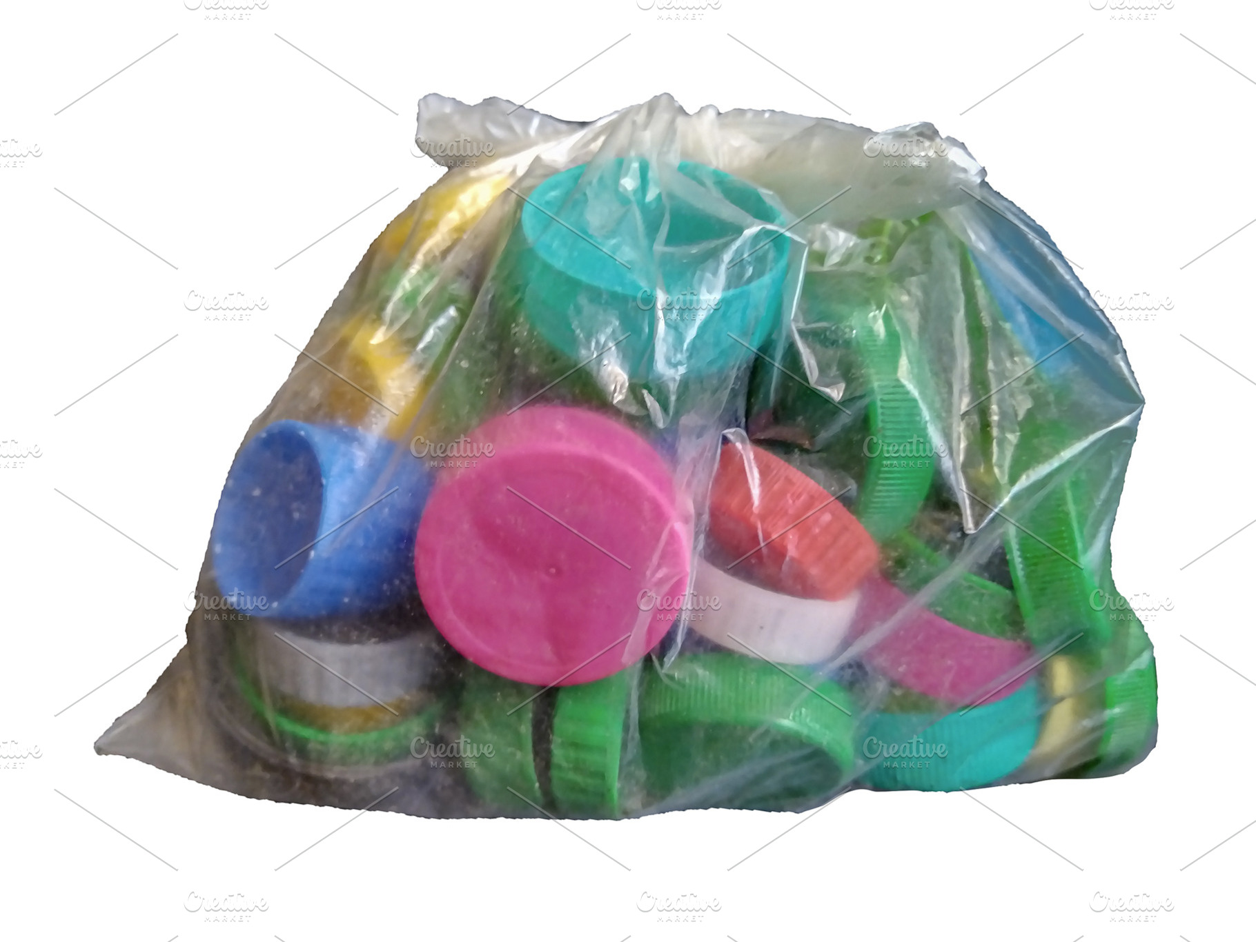 Plastic caps in transparent bag isolated photo, an Industrial Photo by DanFLCreativo
