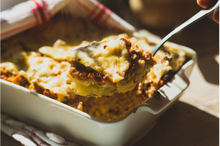 Shepherd's pie in white baking dish, a Food & Drink Photo by oksix