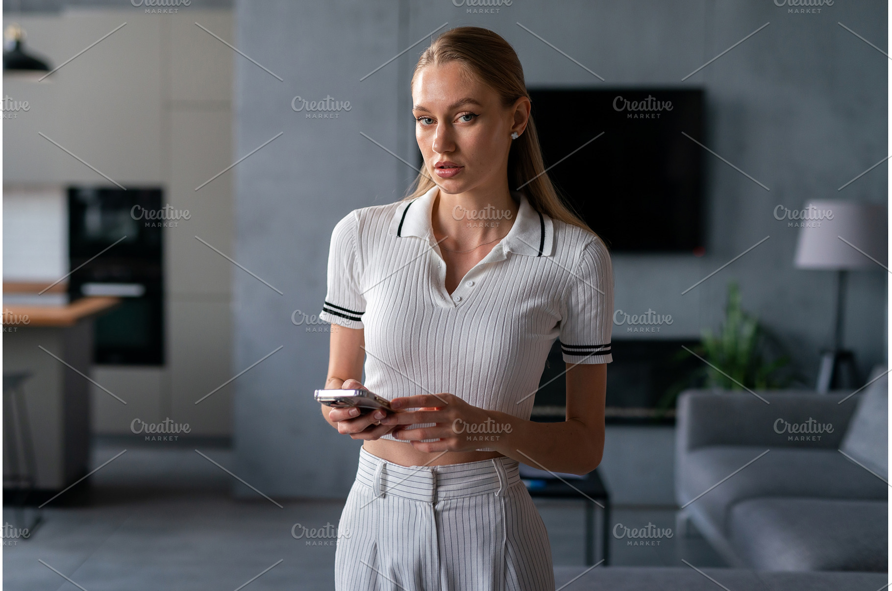Female in white clothing at home, a Person Photo by undrey
