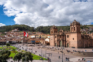 Cusco Cathedral in Plaza de Armas with Tourists on the Steps, an Architecture Photo by GoodGoods