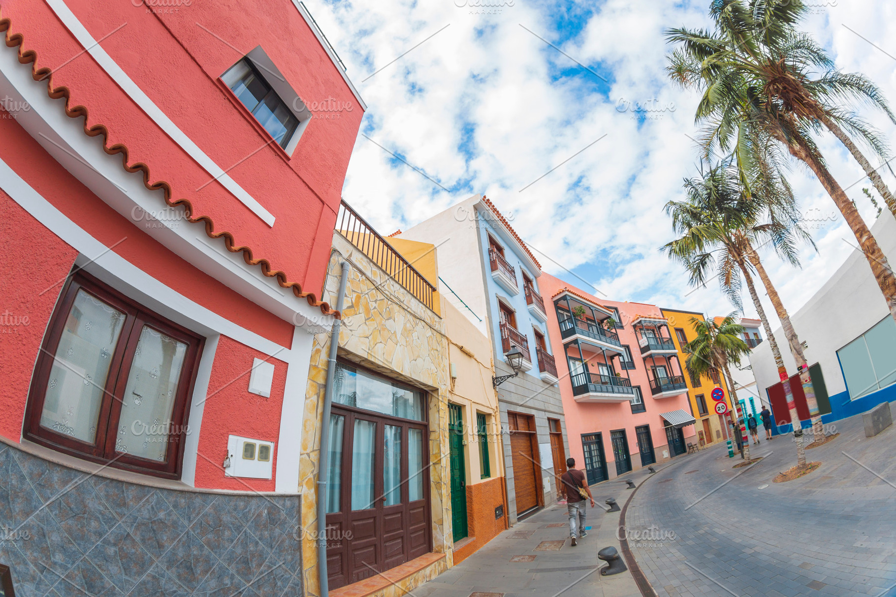 Tourist walking on colorful street in Puerto de la Cruz Tenerife, a Photo by Pictures for you!!!!!!!!!