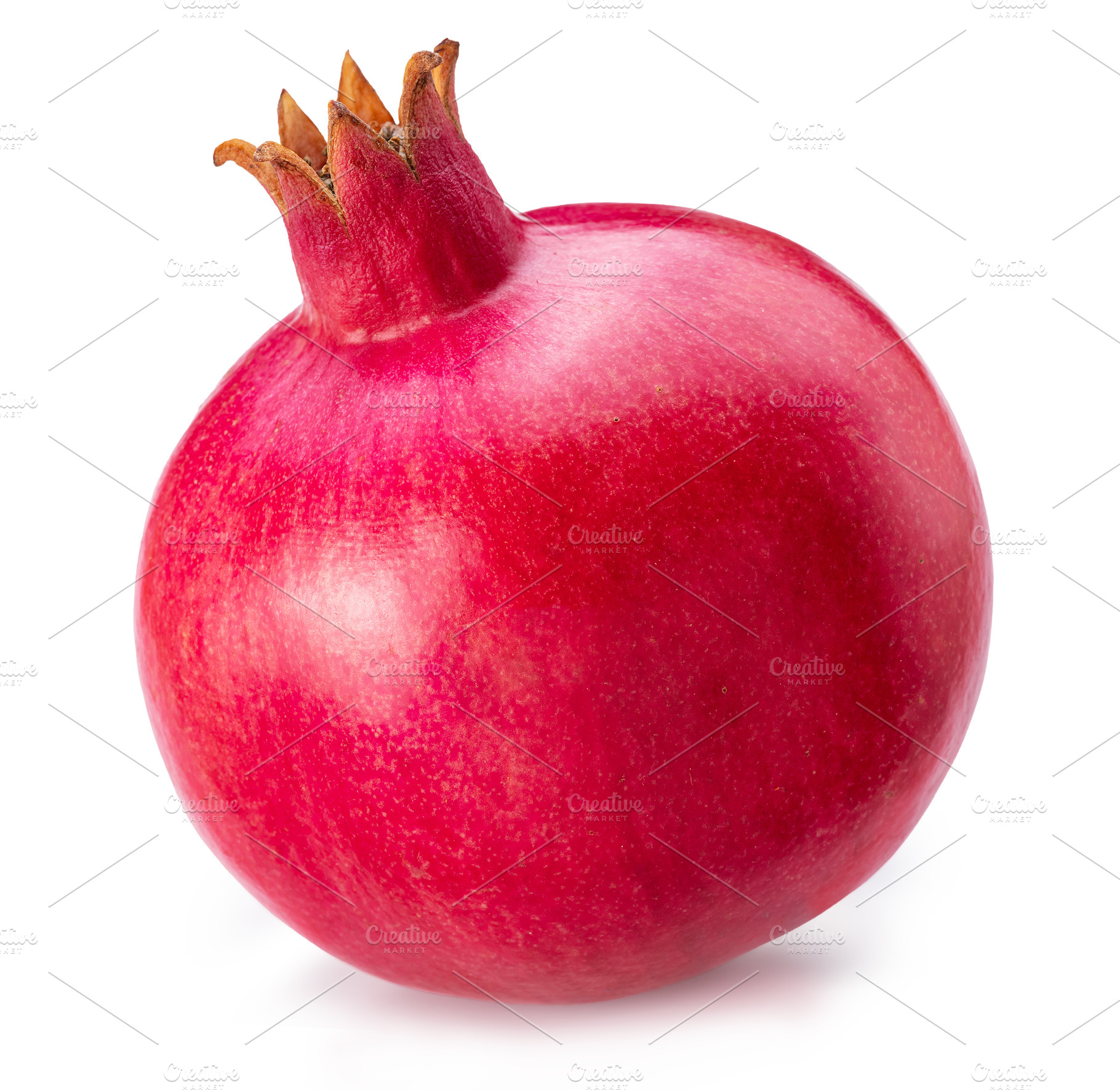 One ripe red pomegranate fruit isolated on white background. Fil, a Food & Drink Photo by Volff