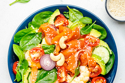 Ketogenic diet salad with salmon, shrimp, avocado, spinach, cucu, a Food & Drink Photo by 5PH