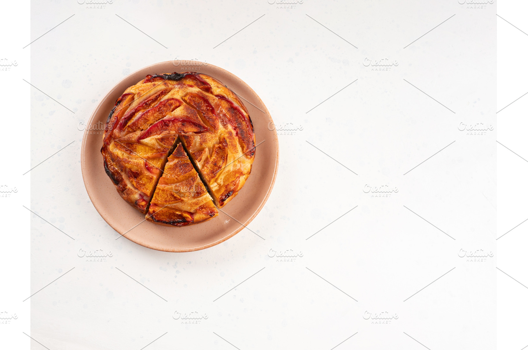 Vegan nectarine peach cake on white, a Food & Drink Photo by Lifemorning