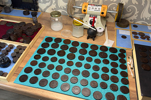 A collection of Russian Empire 5 kopecks of Catherine II coins displayed on a t, an Industrial Photo by Textures & Backgrounds