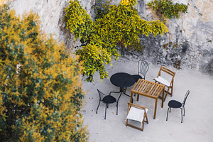 Rustic outdoor patio seating, a Food & Drink Photo by SkyNext