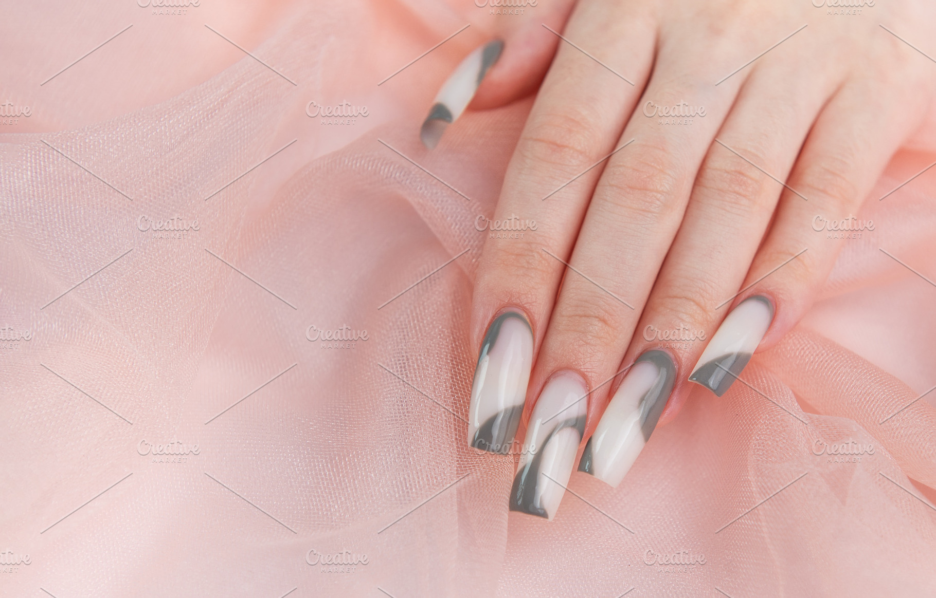 Hand with long marble nail art design, a Beauty & Fashion Photo by Olena Rudo