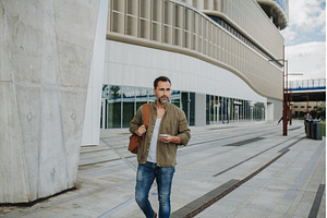 Portrait of confident middle-aged, a Person Photo by HalfPoint