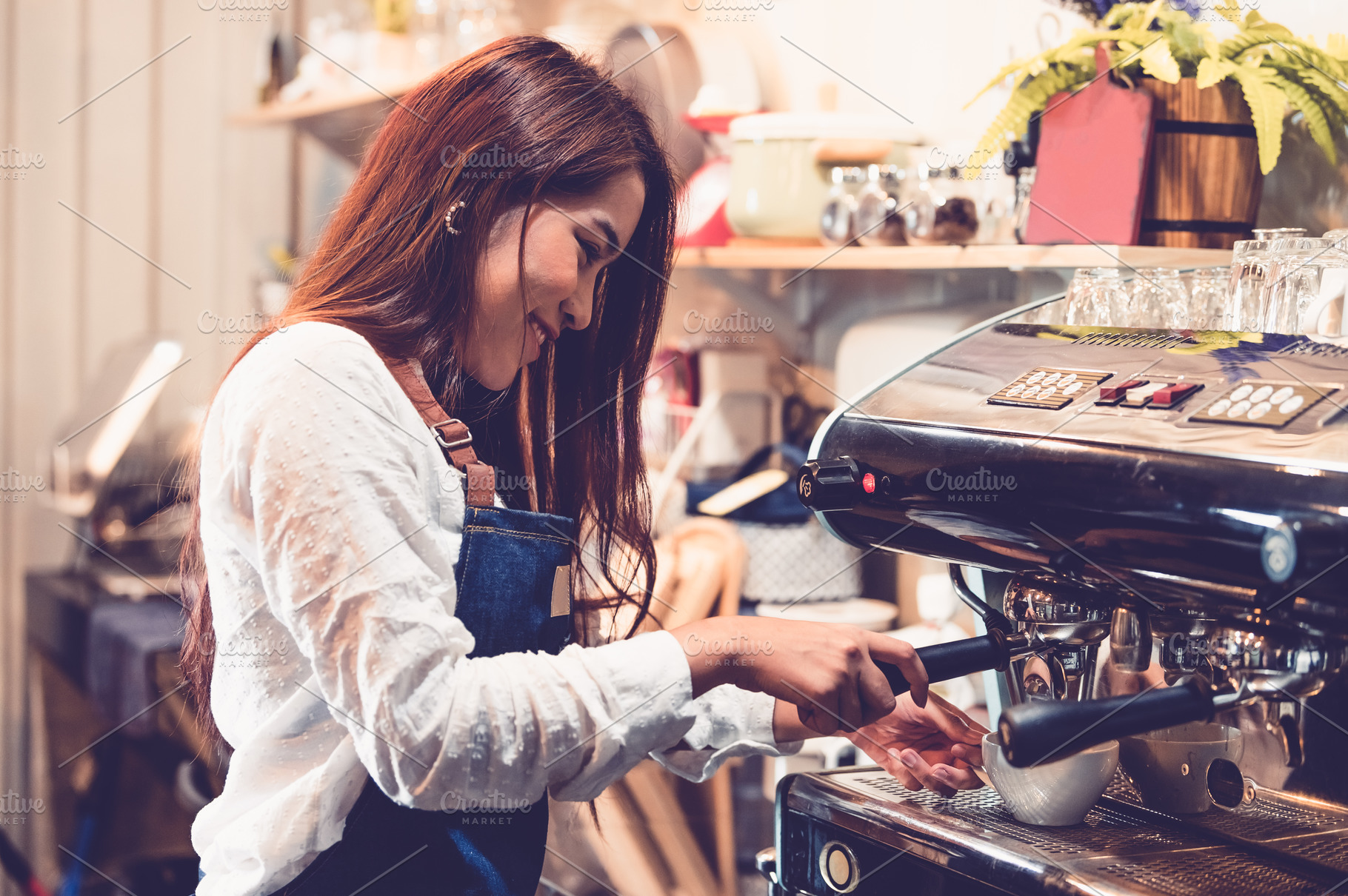 Professional female barista hand making cup of coffee with coffe, a Person Photo by Ministocker